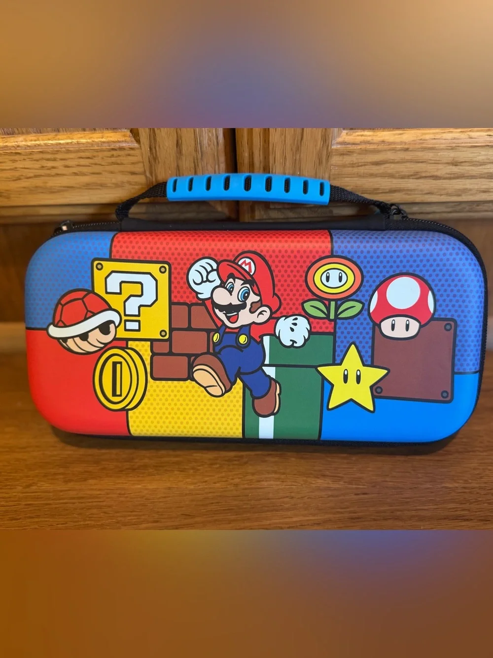 Nintendo Switch Mario Portable Case in Red, Blue, Yellow